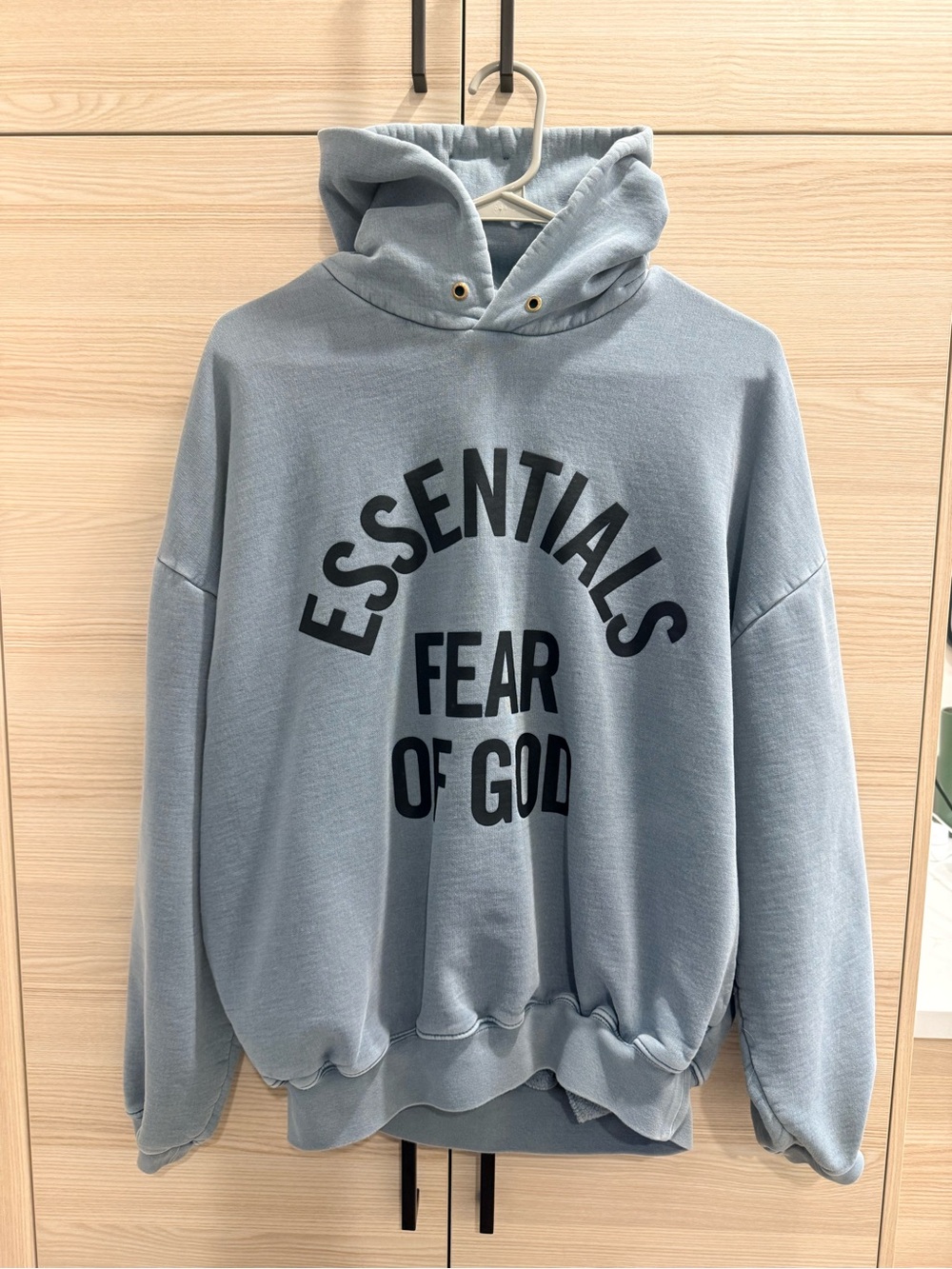 Essentials Fear of God Hoodie in Pale Blue with Black Print